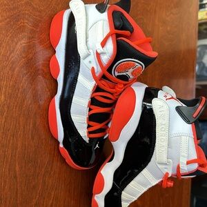 Air Jordan’s great condition, Black, Orange and White size Boys 5.5, worn twice.